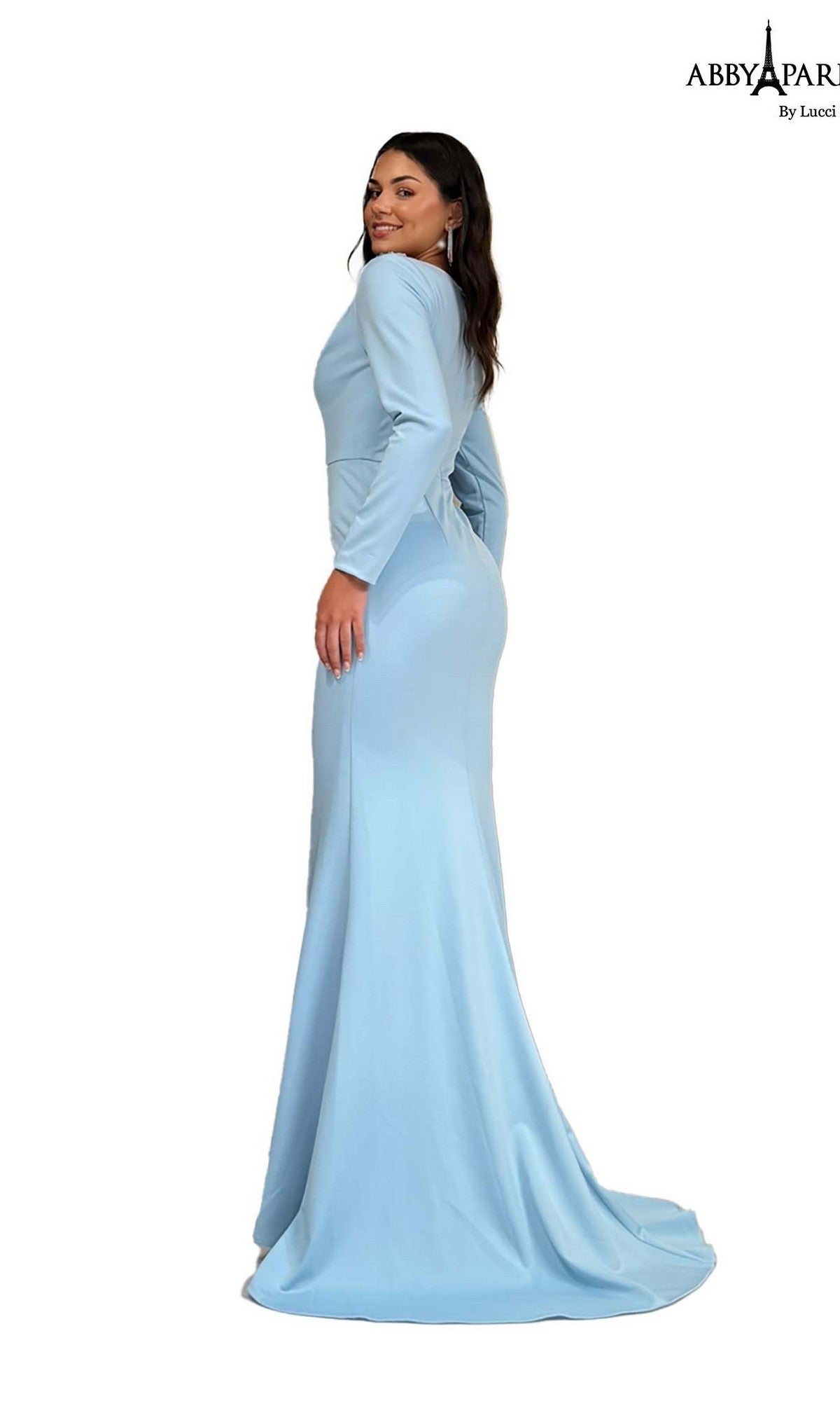 A woman poses against a white background with one hand on her hip, looking over her shoulder in the elegant and sophisticated Abby Paris 96090 Long Formal Dress—a modest, light blue fitted gown that exudes charm.